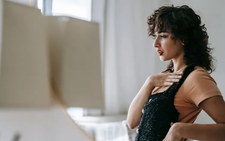 Side profile of a woman with a calm, contemplative expression