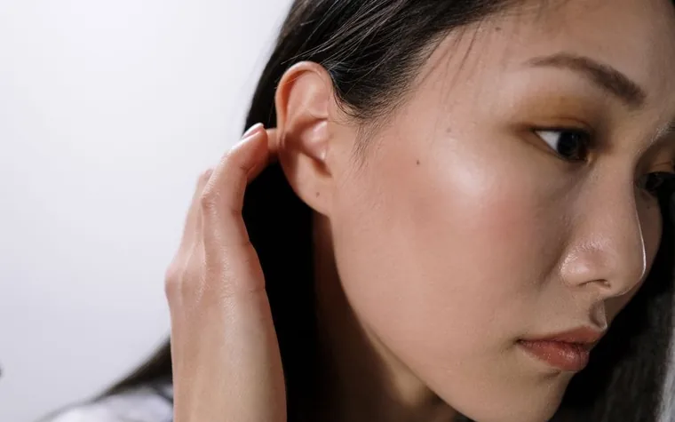 Close-up of a woman's smooth, clear facial skin
