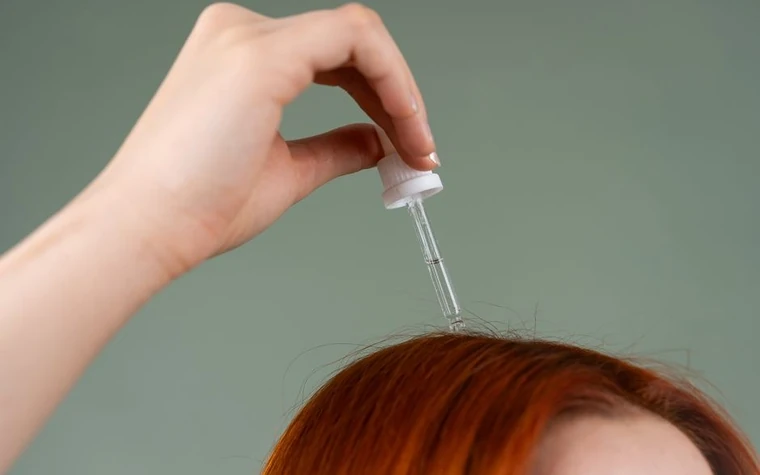 Close-up of a dropper bottle with an oil-based serum